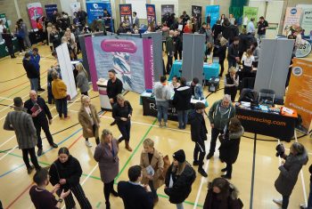 Busy hall with stands