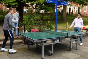 Students playing table tennis