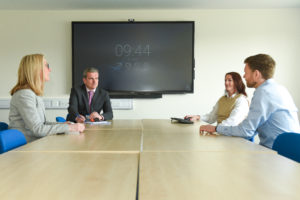 group sitting around a table