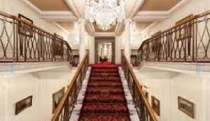 Grand Staircase with large chandelier