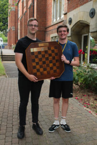 Oli presents Ben Hermanns the 2022 trophy (champion to champion!)