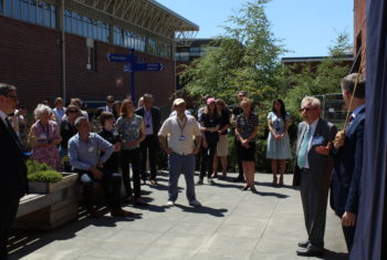 David Arnold (right) speaks to the assembled guests