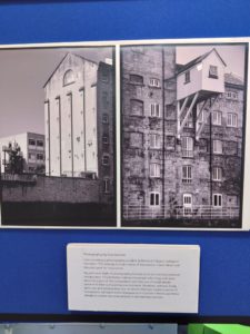 Large black and white photos of 2 ware houses