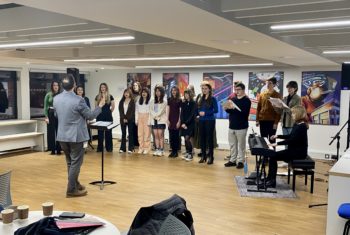 The Collyer’s choir performing in the college’s new cafe.